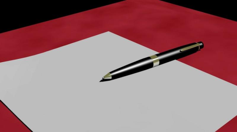 Sjedi mali Ivica i piše pismo...